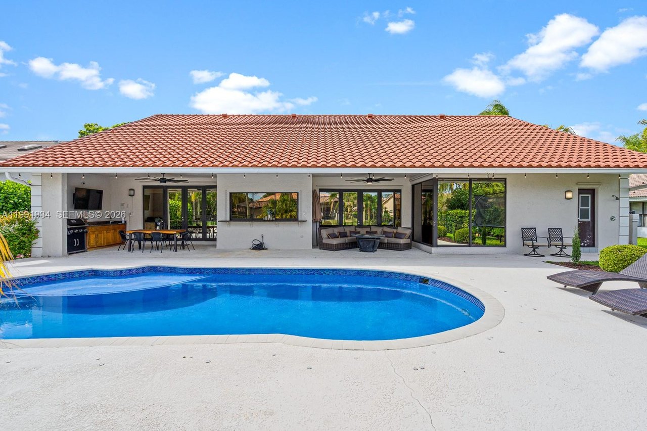 New To The Market: 8412 NW 52 Place, Coral Springs ​| Luxury Waterfront Pool Home in Pine Ridge For Sale