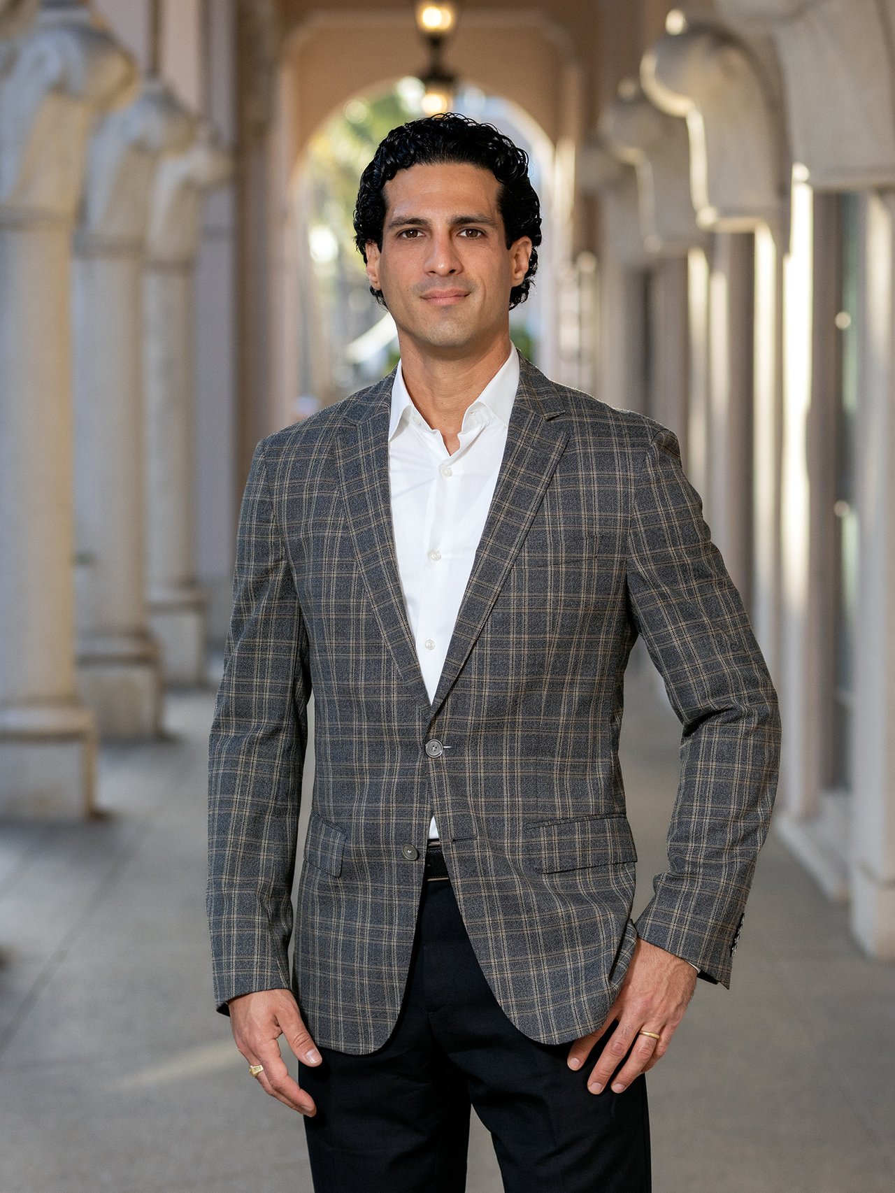 Stefan Banach in a gray plaid blazer and white shirt.