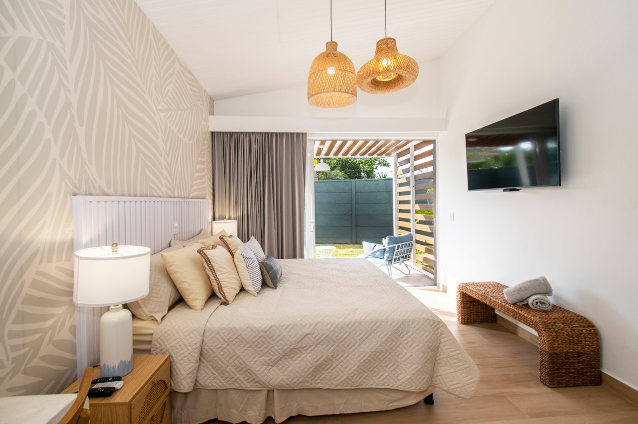 Turnkey Tropical Home Steps from the Beach