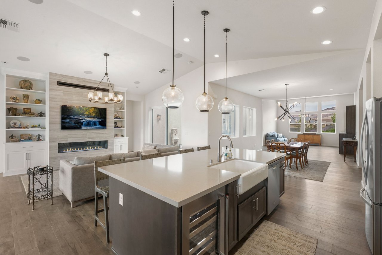 Open-concept kitchen and living room in a Reno home with spacious areas for everyday living and entertaining