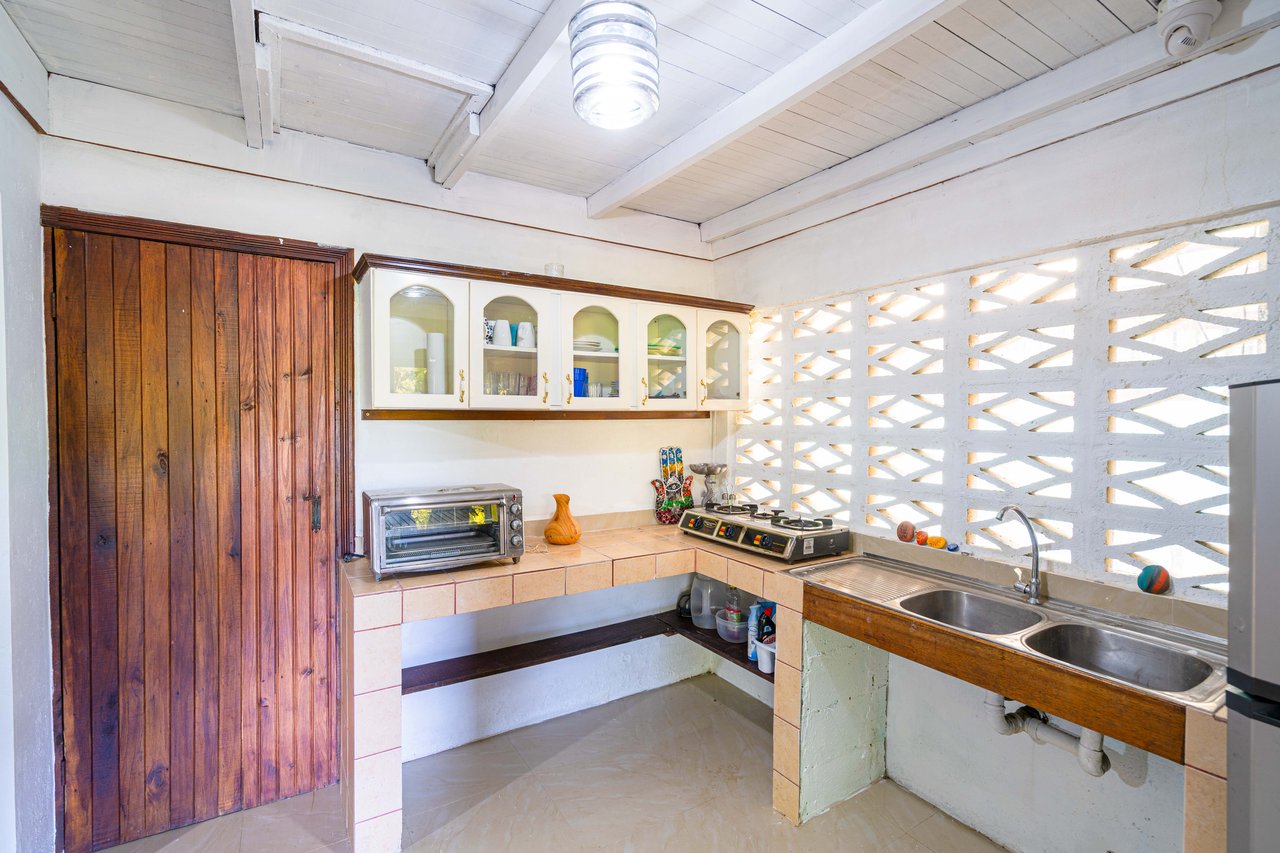 0.15 ACRES – 2 Bedroom Artistic River Home In The Rainforest!!!