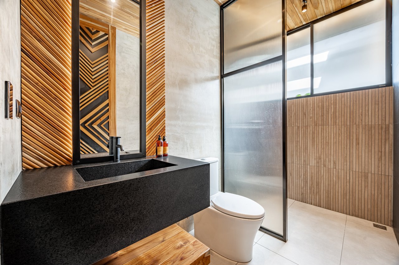 Casa Uchuva | Architectural Harmony of Wood, Stone, and Light