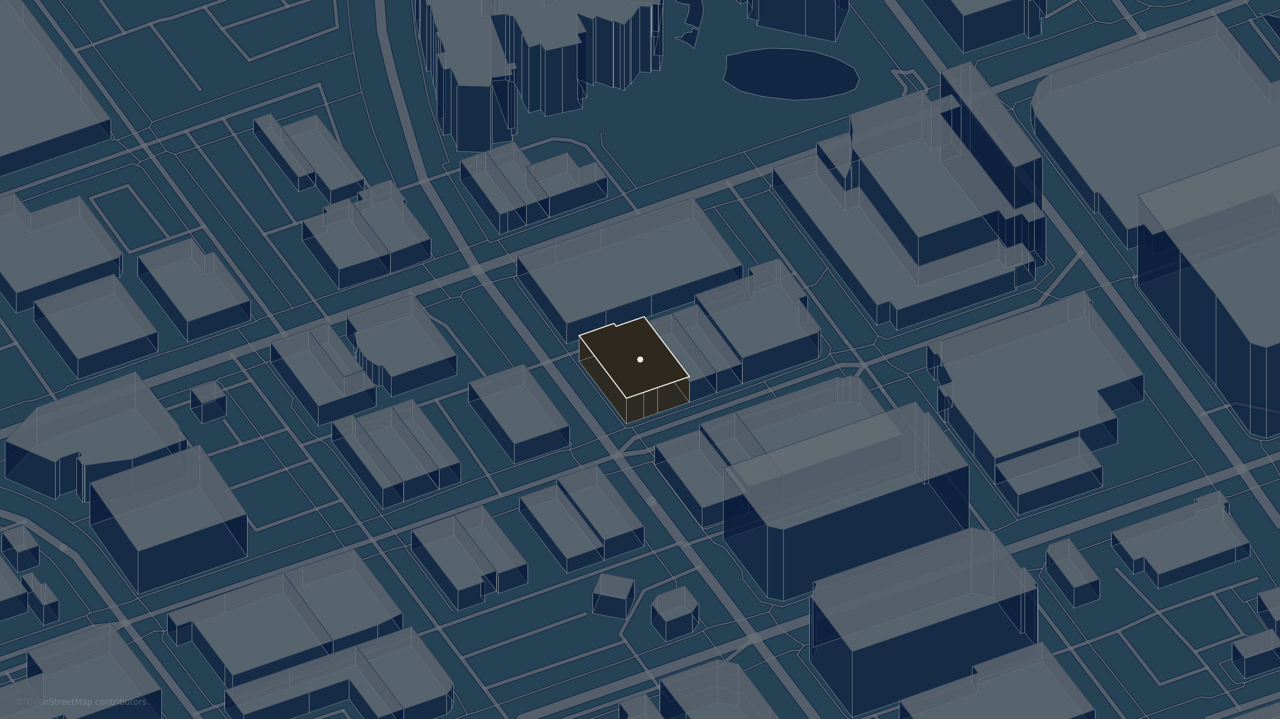 Map highlighting a building among surrounding city blocks.