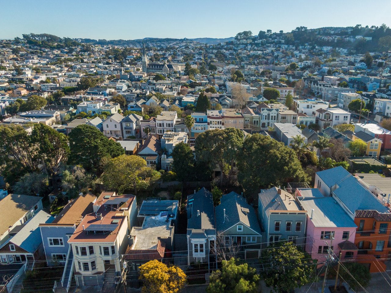 noe valley looking towards St Paul Catholic Church on a beautiful day.