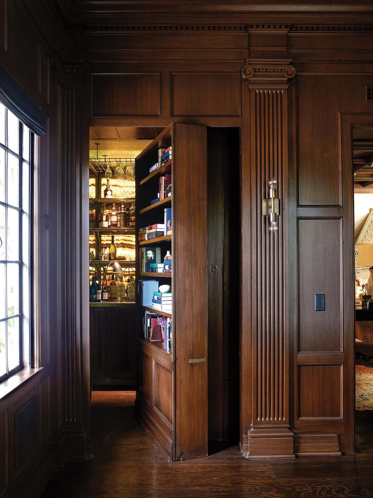 Mysterious hidden entrance inspired by Tampa Bay speakeasies and secret cocktail bars