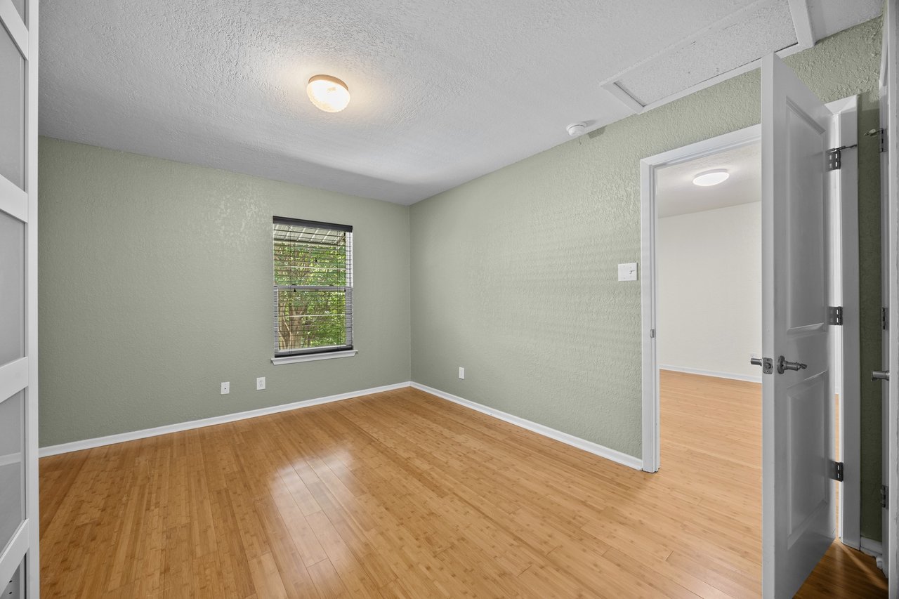 Top-Floor Condo Retreat in Gated Ivy Condos | Private Balcony + Tree-Filled Views