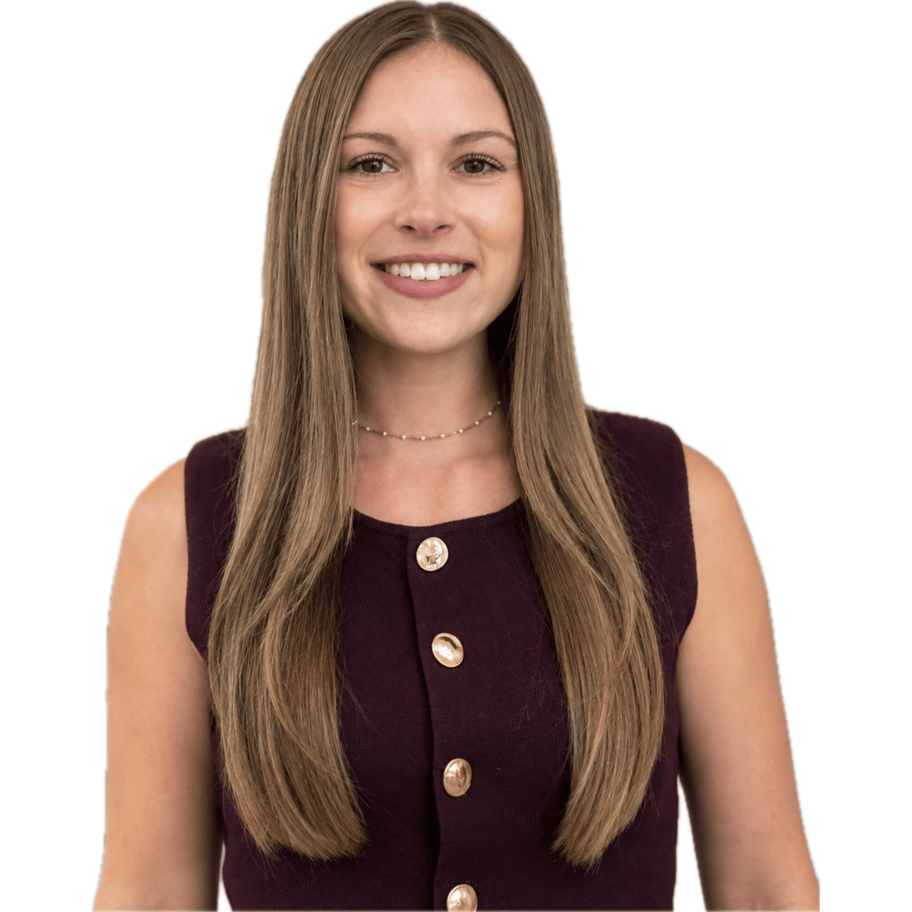 Cortney Vaughan smiles in a burgundy sleeveless top with gold buttons.