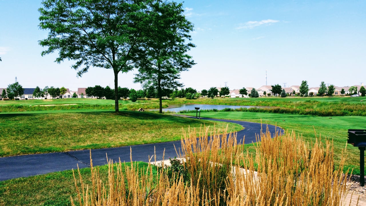 Carillon Club 55+ Community Naperville has beautifully landscaped grounds and walking paths