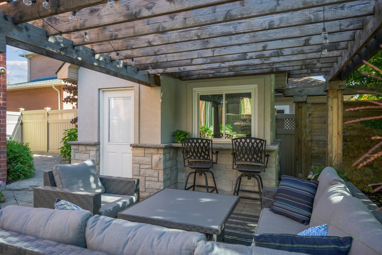 Resort-style yard backing onto lush ravine