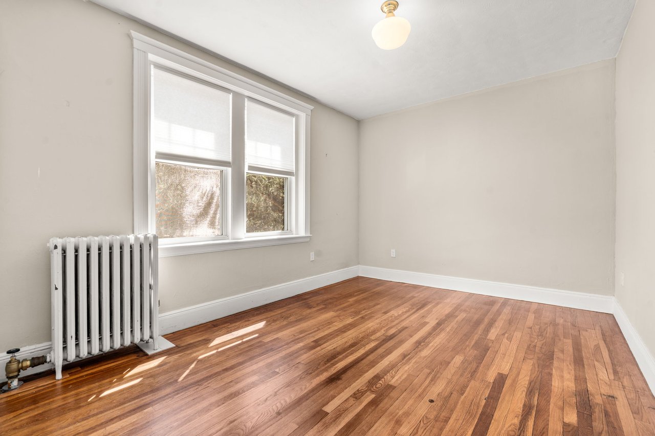 Bright by Design: A Fully Updated Corner Unit on South Huntington