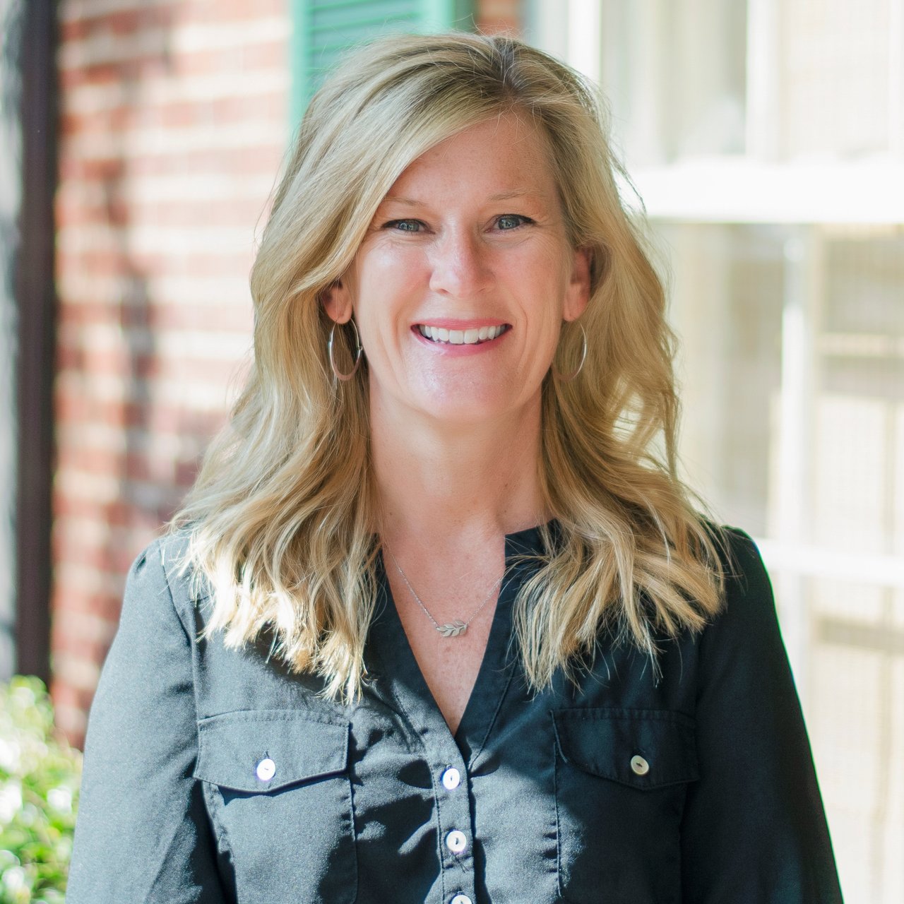 Laura Futty, VA Real Estate Agent Headshot