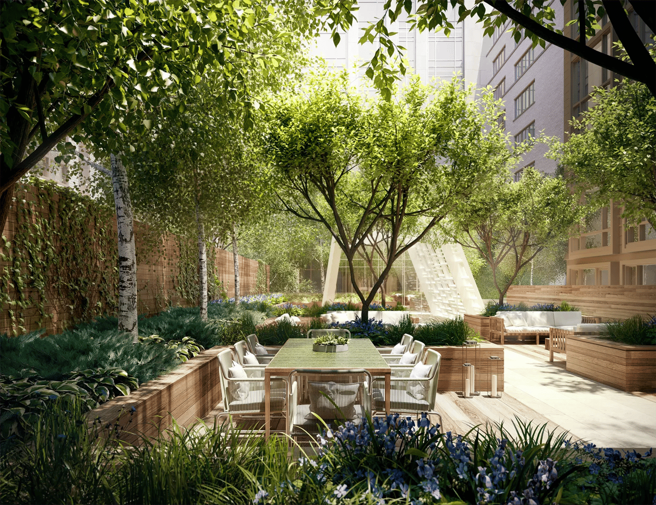 Residential courtyard with leafy trees, outdoor dining furniture, and a white sculptural structure.