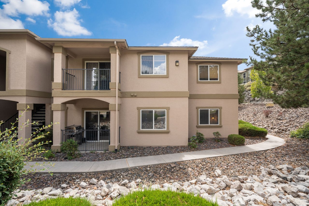Front exterior of the Silver Creek condominium building at 6850 Sharlands Avenue in Northwest Reno, Nevada.
