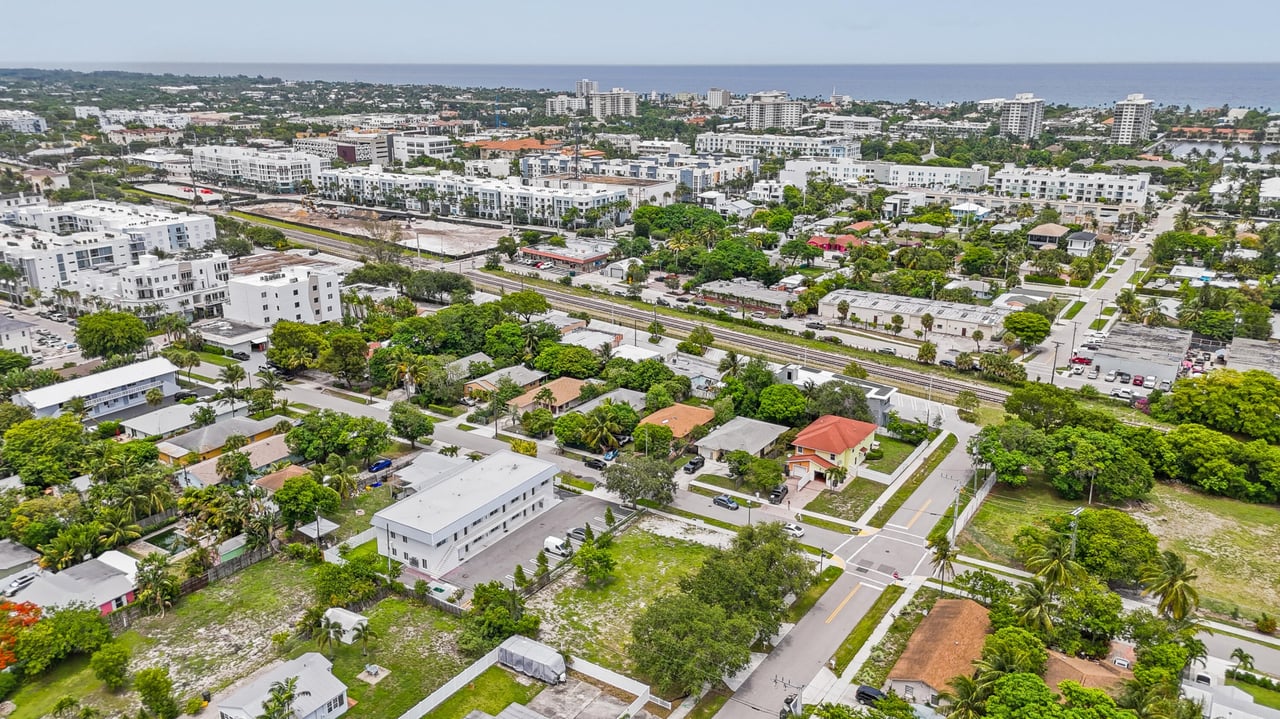 Aerial view showing 248 SE 1st Ave, Delray Beach, surrounded by residential homes and close to downtown, perfect for new townhome construction.
