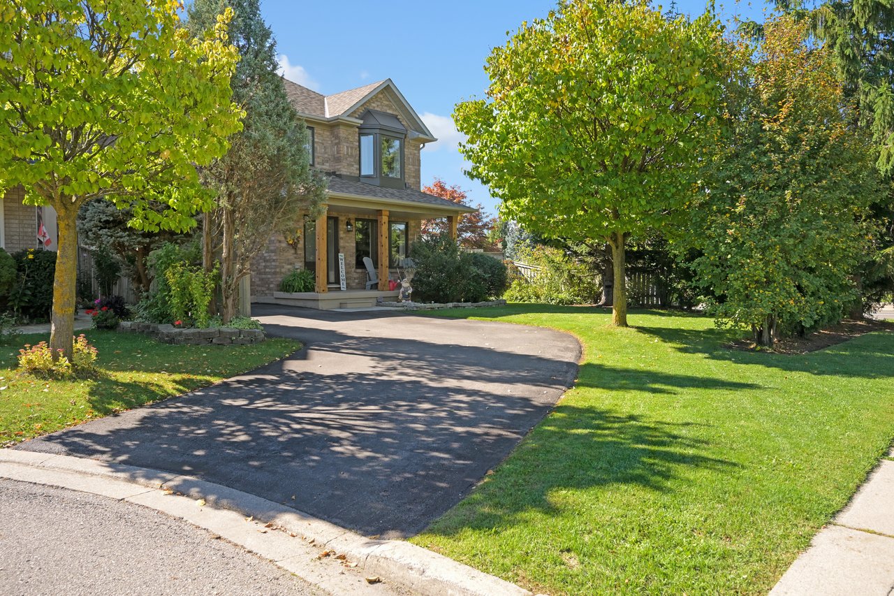 Sun-Filled Sophistication on a Rare Pie-Shaped Lot in West Oak Trails