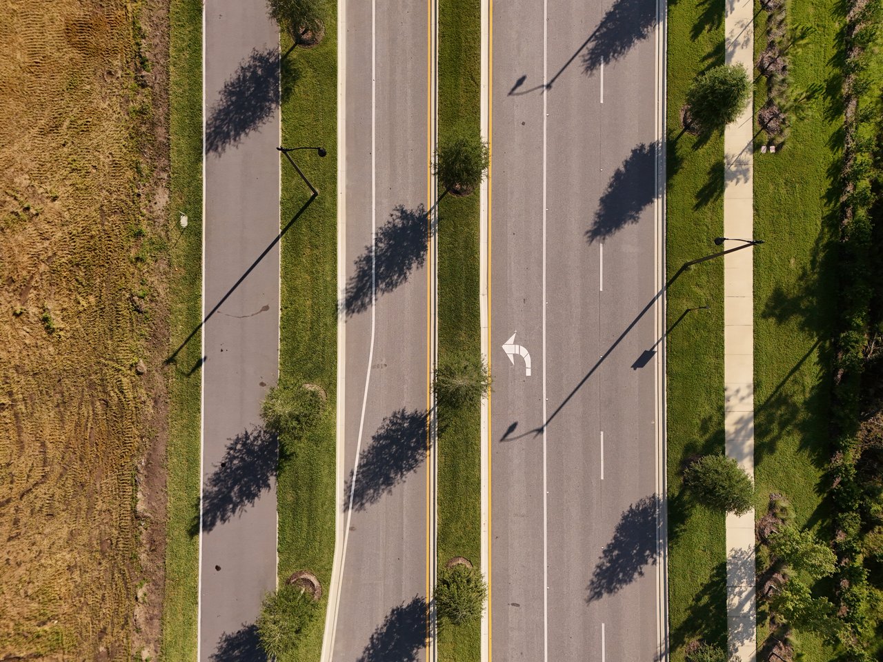 Tree-Lined Boulevard in EverRange New Construction Community