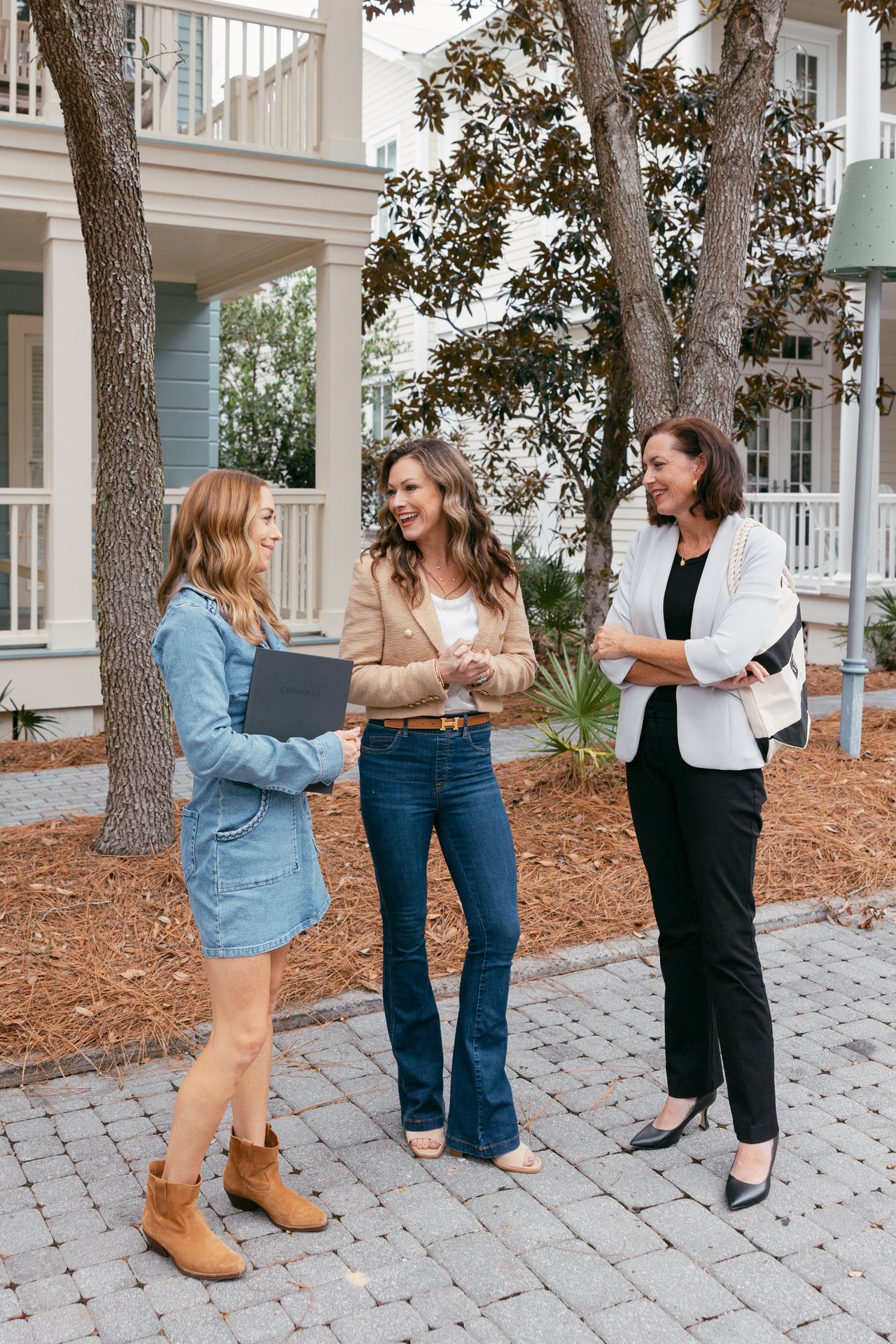 Real estate agent Kendall Hood assisting buyers and sellers with property transactions in Santa Rosa Beach, showcasing expertise and personalized service.