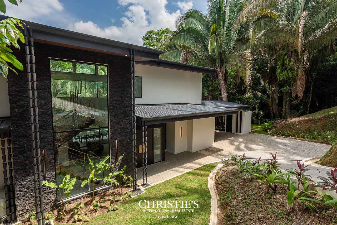 Modern Tropical Ocean & Mountain View Home