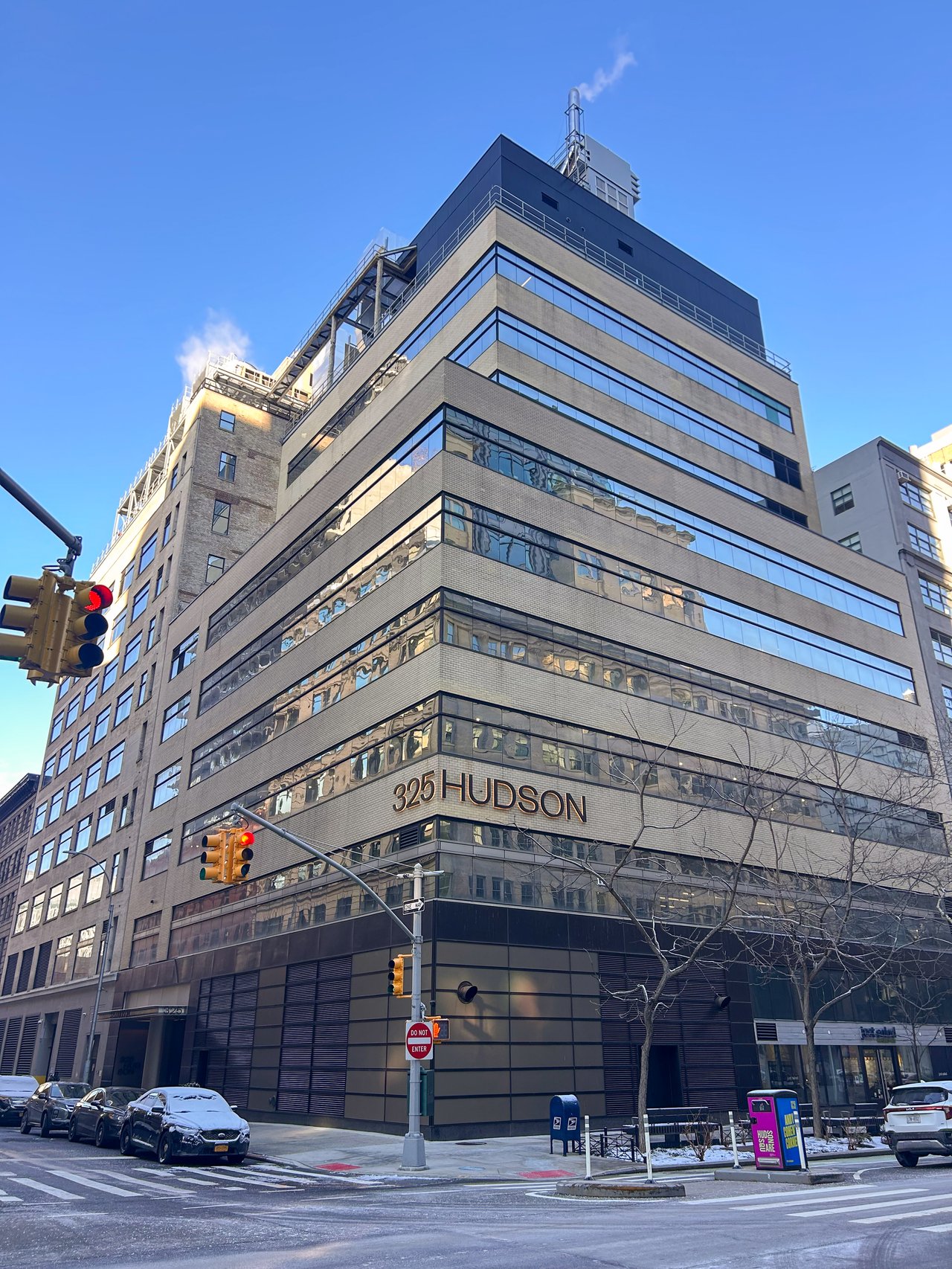 Parents and adult child having a thoughtful conversation about buying a home in New York City