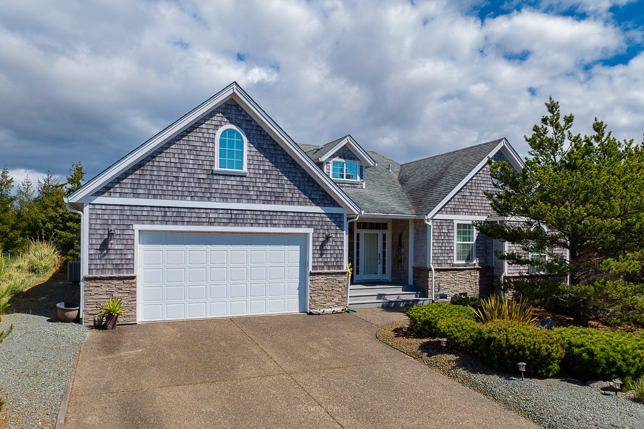 Sold single-level Pine Ridge home at 34695 Lodgepole Drive in Manzanita Oregon with bay and mountain views