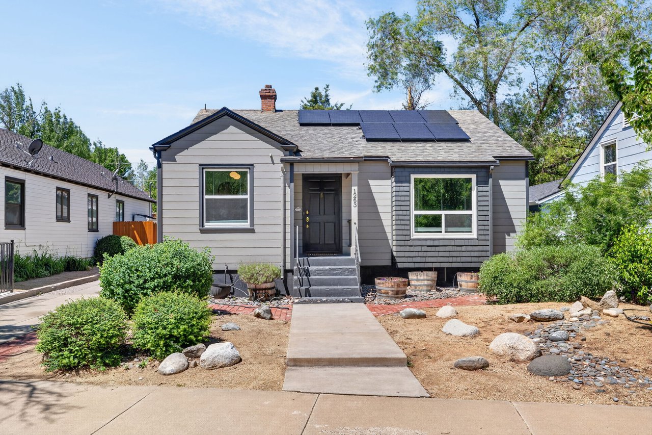 Craftsman bungalow exterior at 1263 Nixon Avenue in Old Southwest Reno surrounded by mature trees