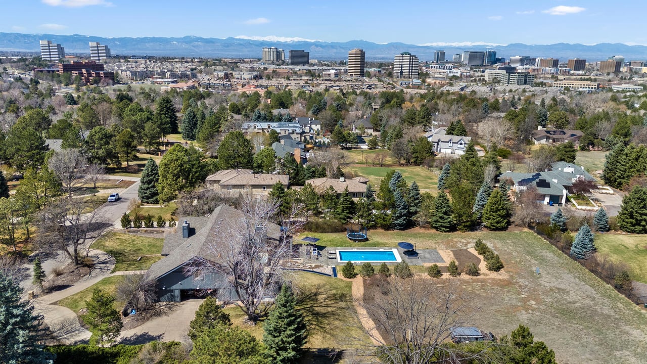 Luxury home on large treed lot in Cherry Creek area with mountain views and pool