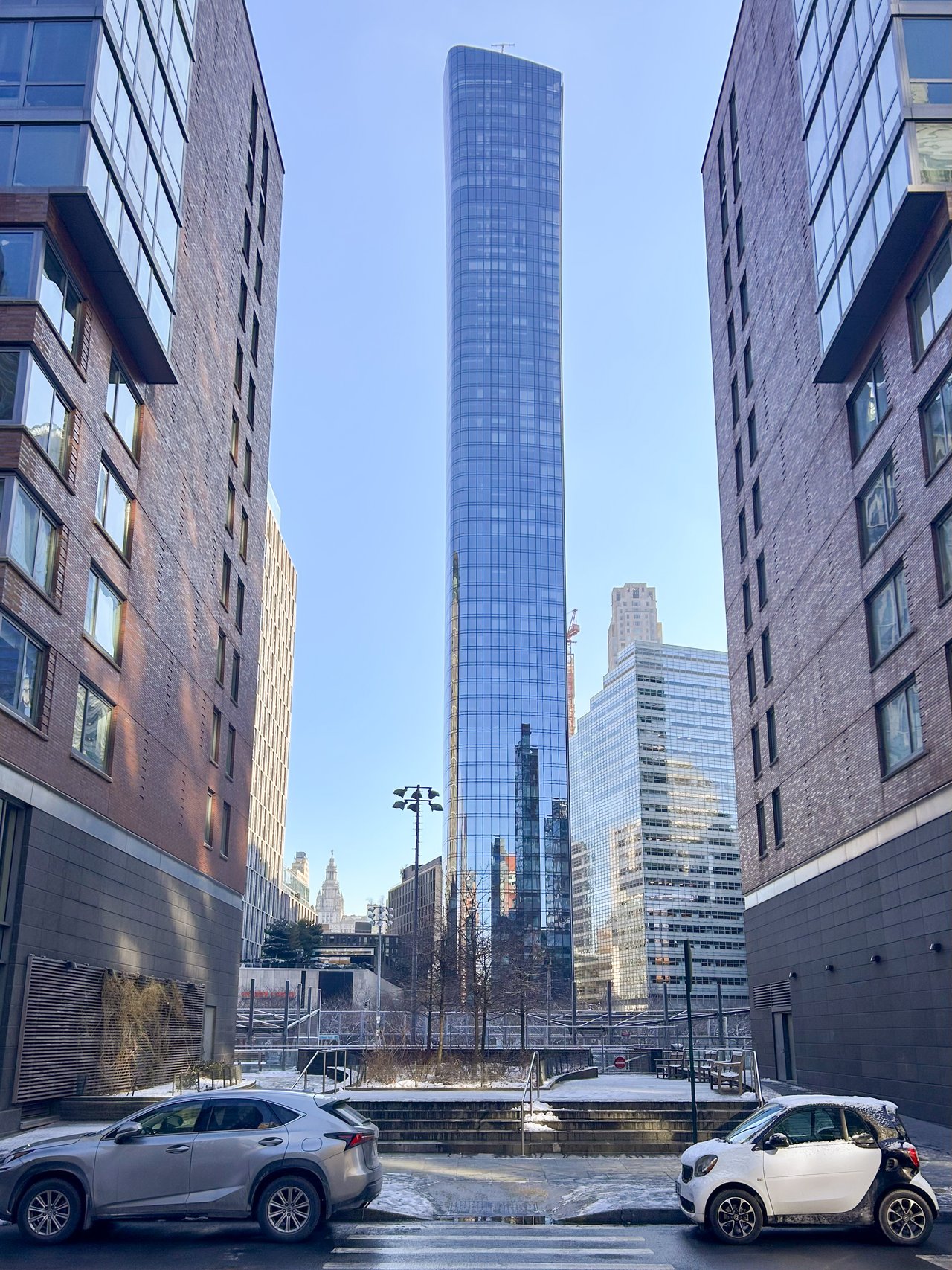 Parents and adult child reviewing a New York City apartment purchase together