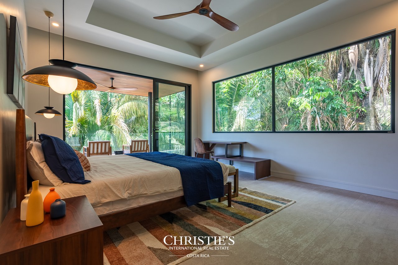 Modern Tropical Ocean & Mountain View Home