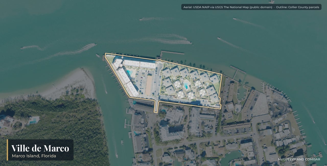 Aerial view of Ville de Marco on Marco Island, Florida, its low-rise buildings on the water along Edington Place at the edge of Olde Marco