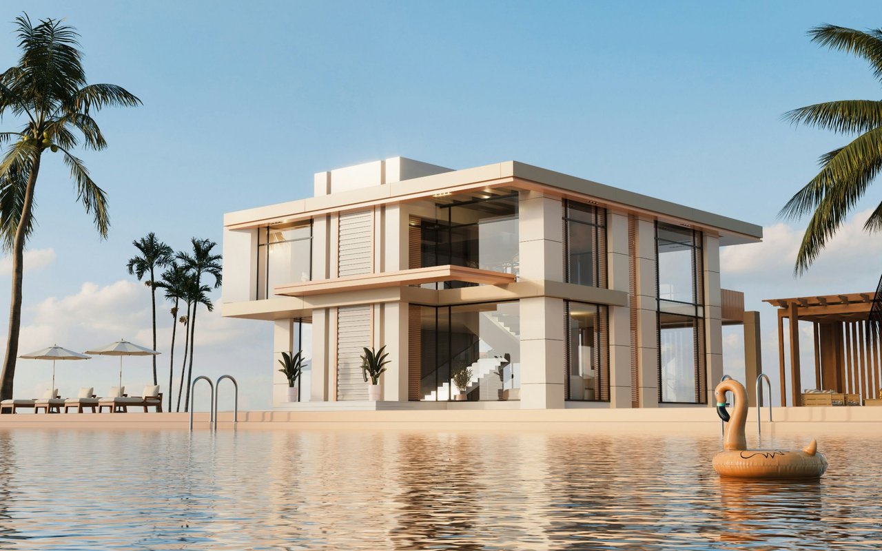 Modern two-story house beside a pool, framed by palm trees with an inflatable flamingo in the water.