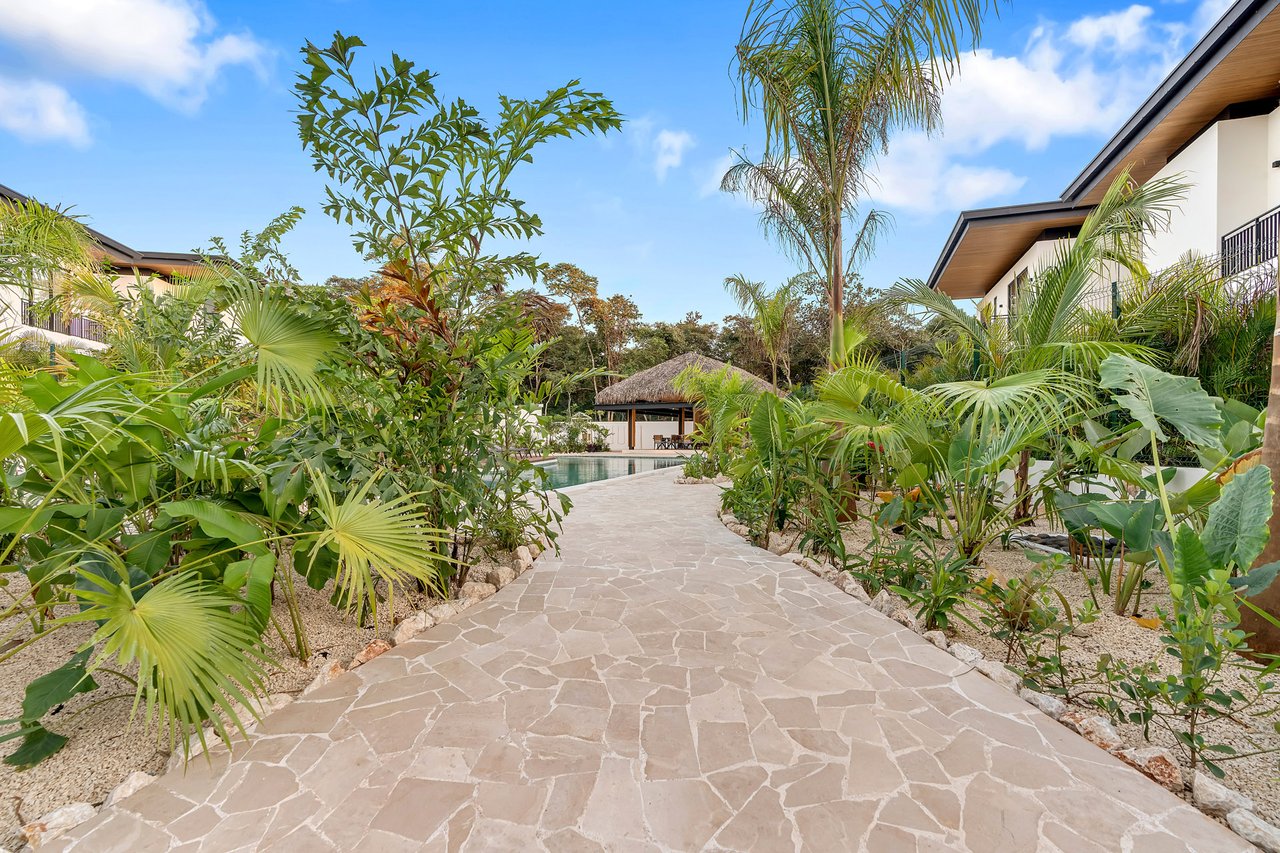 Villa Tropical Dawn | 4-Bedroom Modern Oasis in Bosques de Pinilla with Forest Views & Resort-Style Amenities