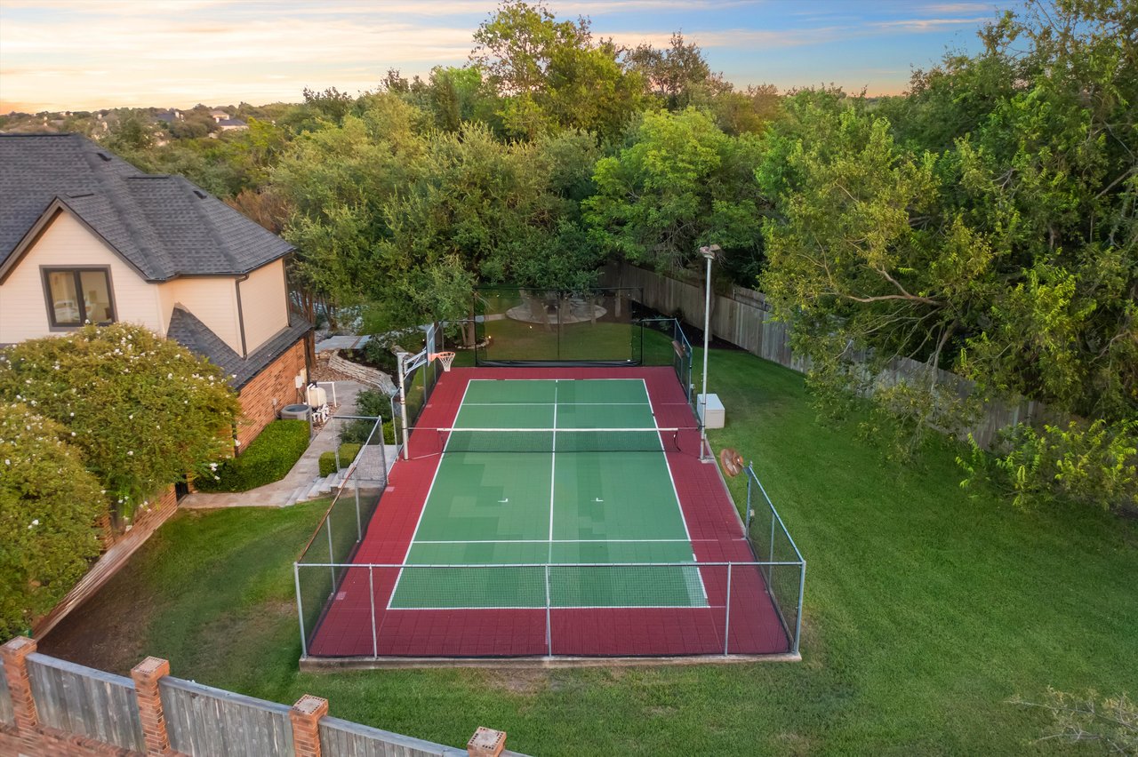 Northwest Hills legacy home with sport court, pool, and dream backyard.