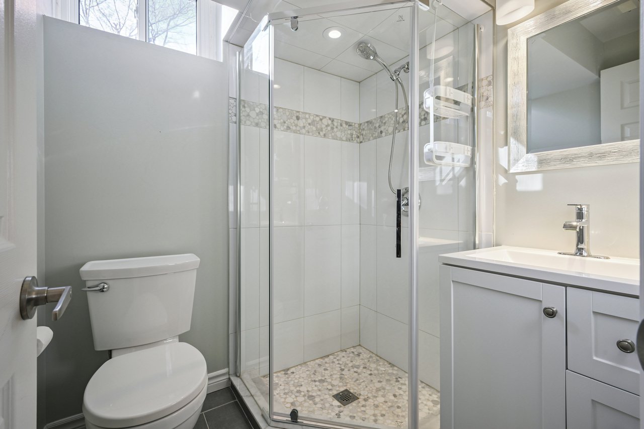 Sun-Filled Sophistication on a Rare Pie-Shaped Lot in West Oak Trails