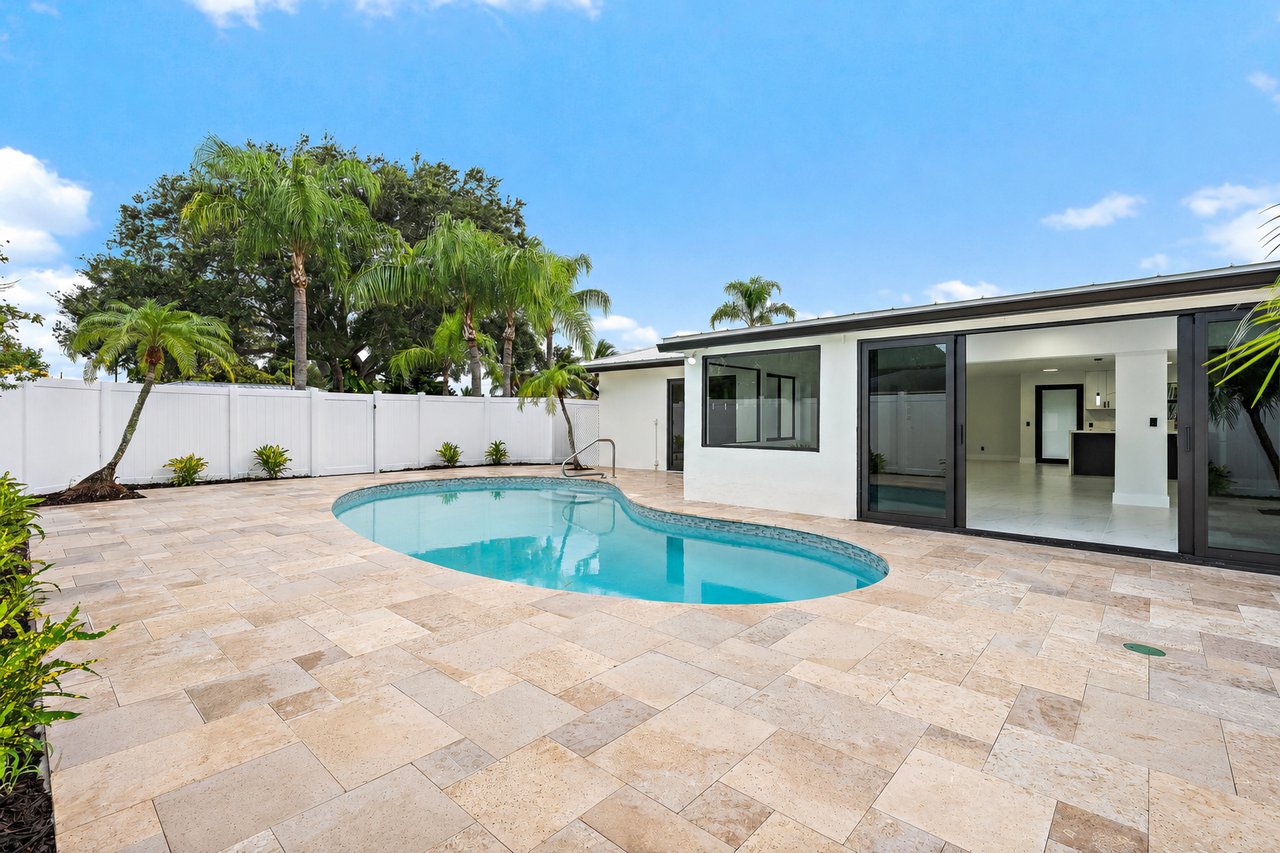 Renovated non-HOA home with heated pool at 360 Saturn Ave, Tequesta, Florida