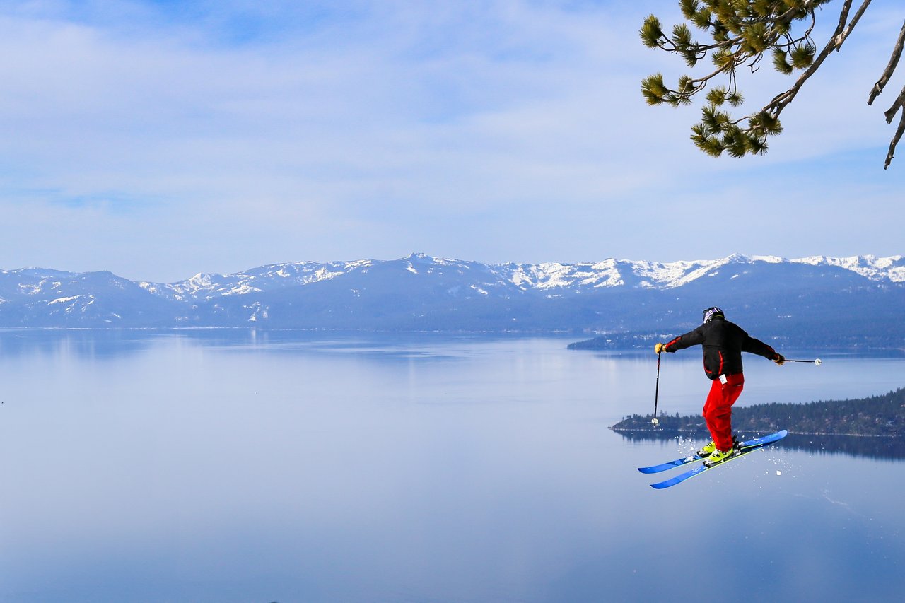 Snow-covered slopes of Diamond Peak Ski Resort with Lake Tahoe in the background, near Incline Village homes for sale