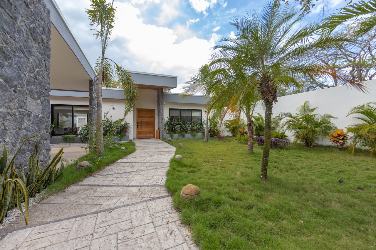 Casa Guacamaya Roja Lot B20 | Elegant 4-Bedroom Home with Pool & Outdoor Kitchen, Steps from Playa Grande Beach, Costa Rica