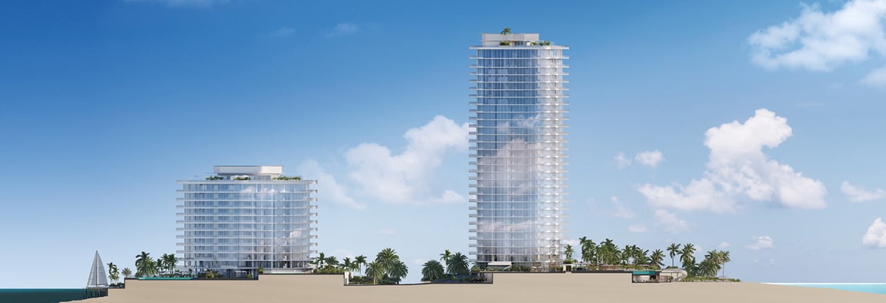 Two glass residential towers beside the water, with palm trees and a sailboat along the shoreline.