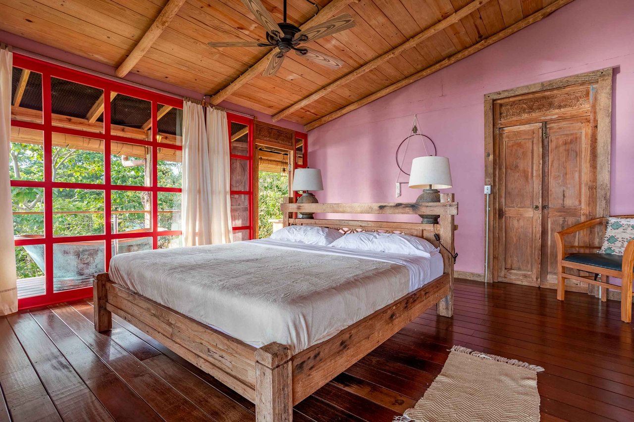 A Handcrafted Residence Immersed in Nature Above the Canopy Ocean View Architectural Home