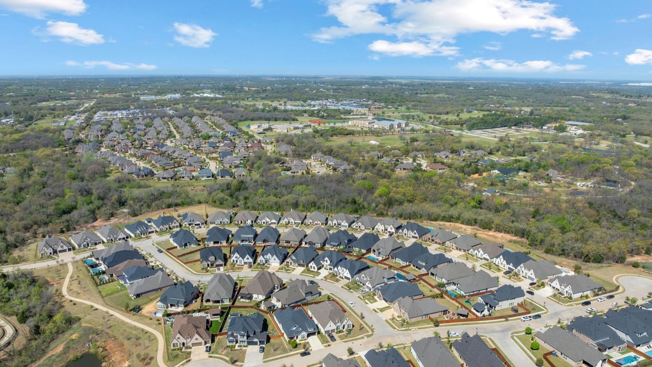 Aerial view of homes for sale in Argyle TX showing master planned neighborhood and large lots