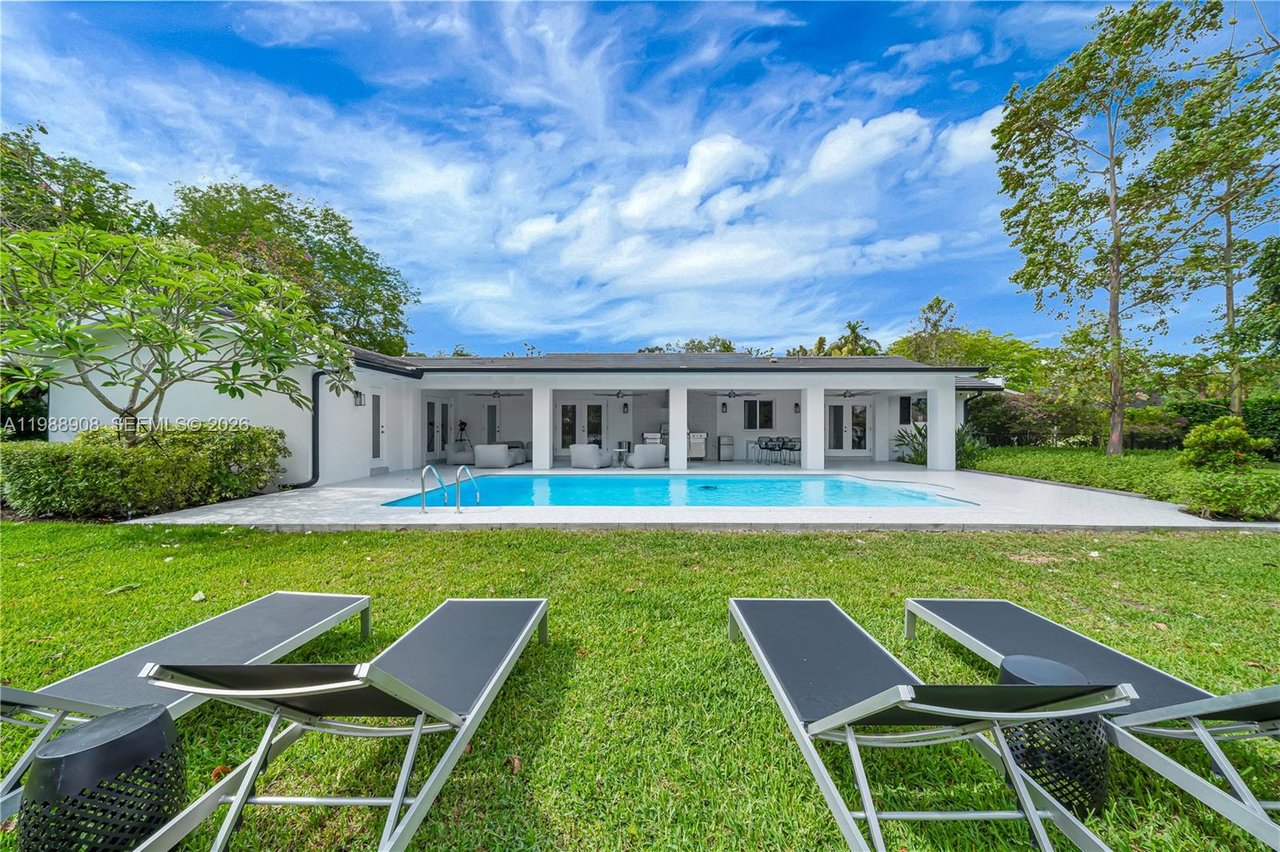 10705-sw-128-terrace-miami-home-for-sale-living-area-backyard-pool