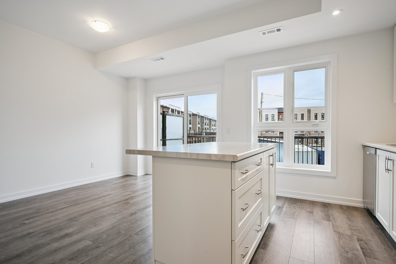 Brand-new, never-lived-in stacked townhome