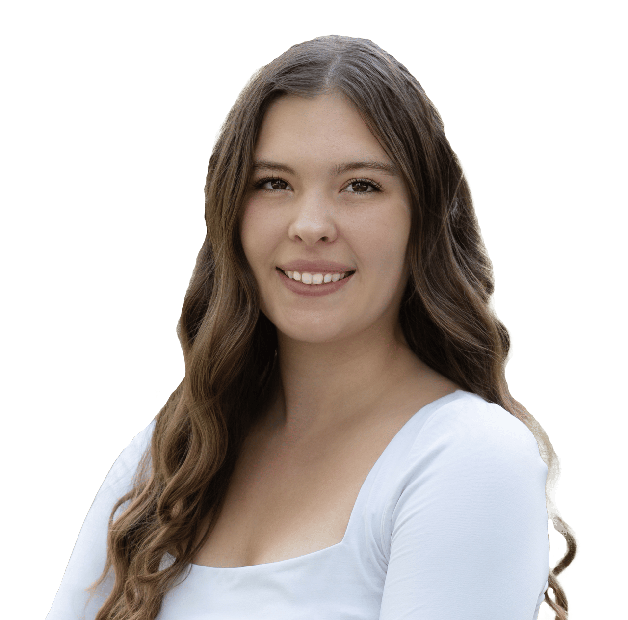 Smiling woman with long wavy brown hair wearing a white top.