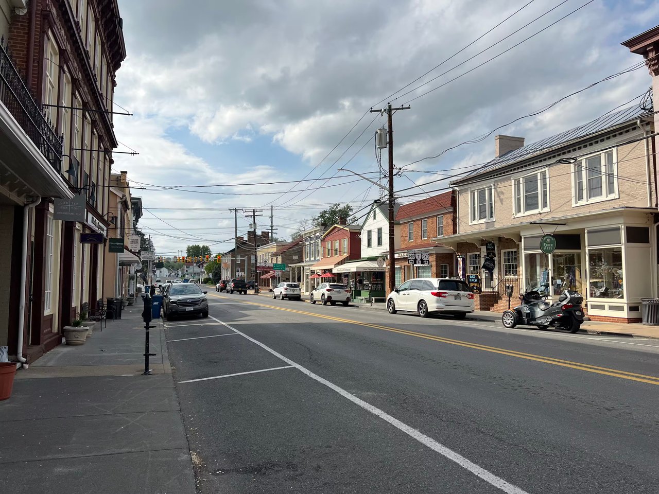 A scenic view capturing the small-town lifestyle and peaceful streets of historic Berryville, VA, explored by local real estate expert Diane Geremia.