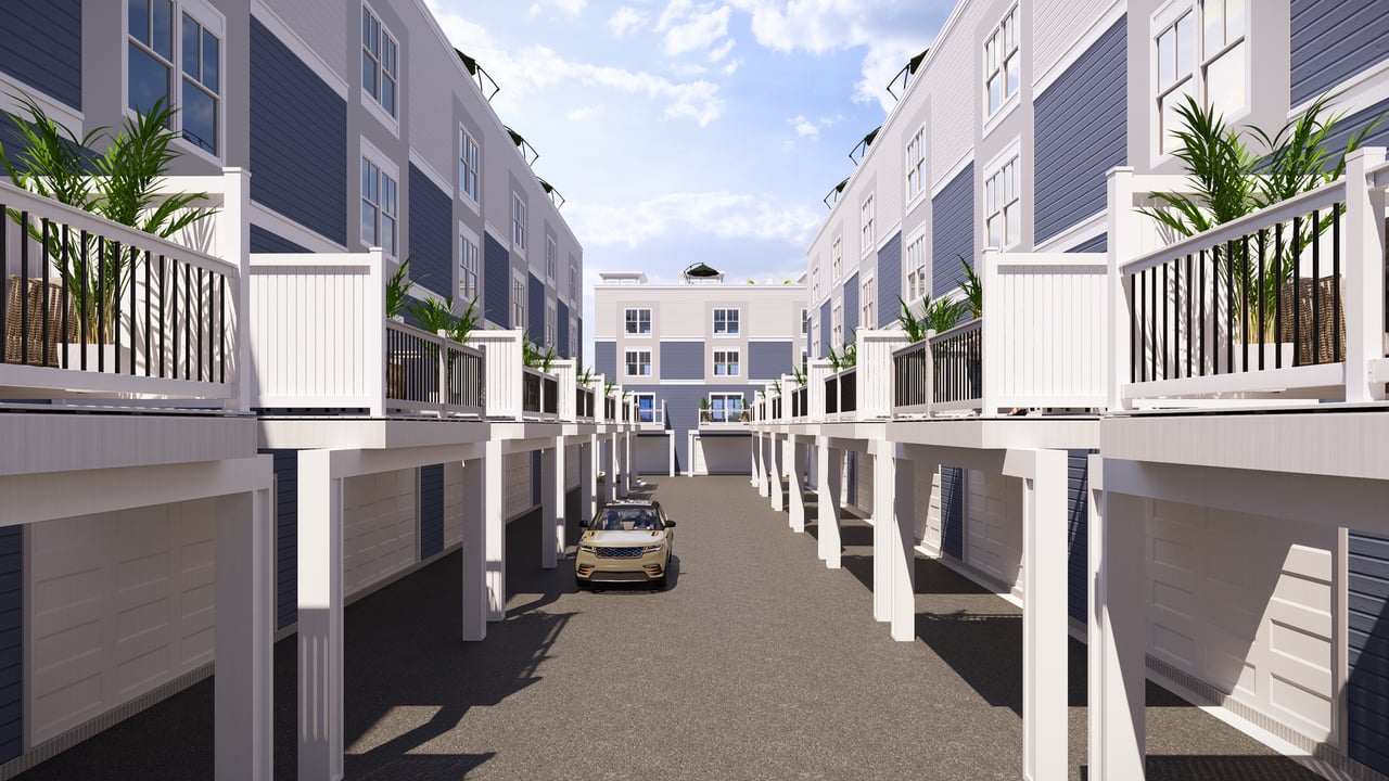 alleyway with balconies over garage entry.