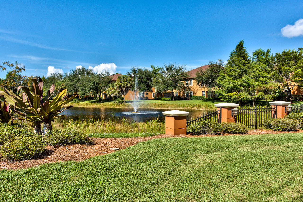 Lake and fountain with coach homes, Terra Vista, Estero, Florida