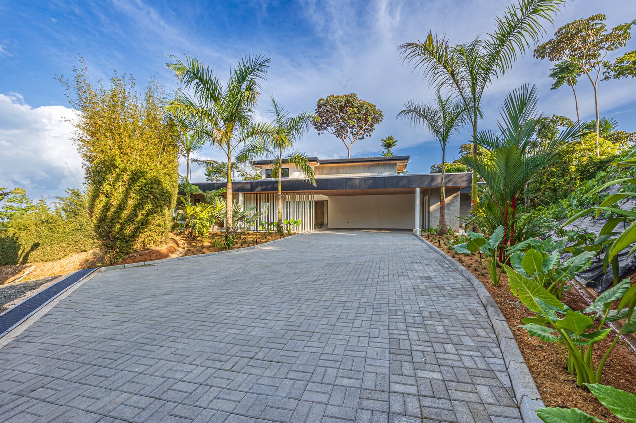 New contemporary tropical villa boasts with a movie theater and views of the iconic whale’s tail