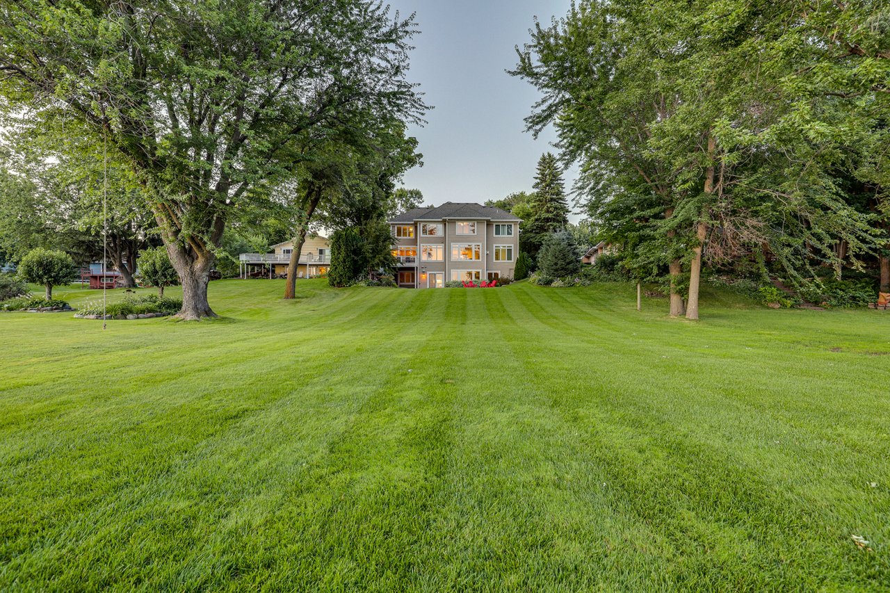 Beautiful 2-Story with 75 Feet of Flat Lakeshore on West Arm Bay