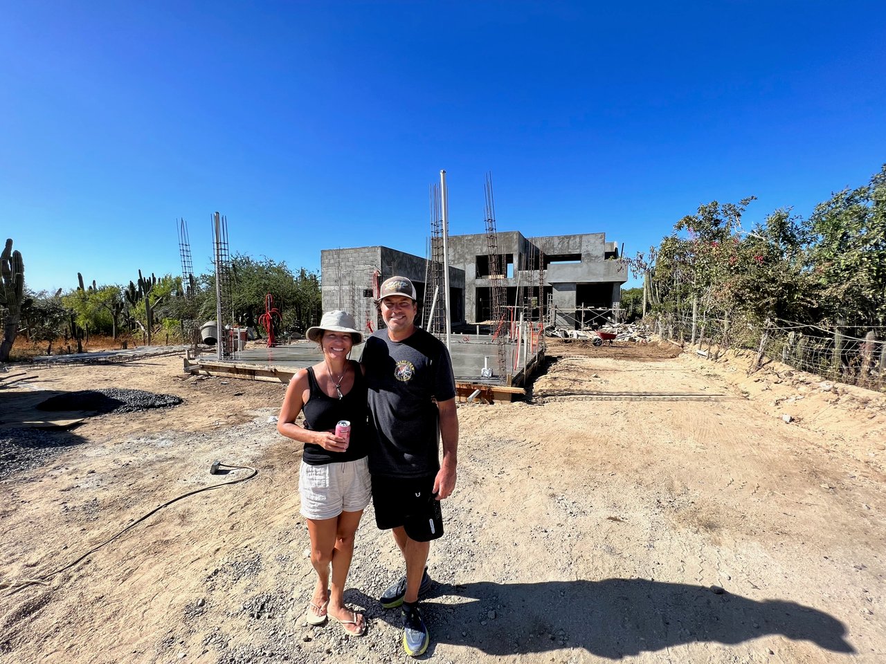 Couple in front of their Baja California home under construction
