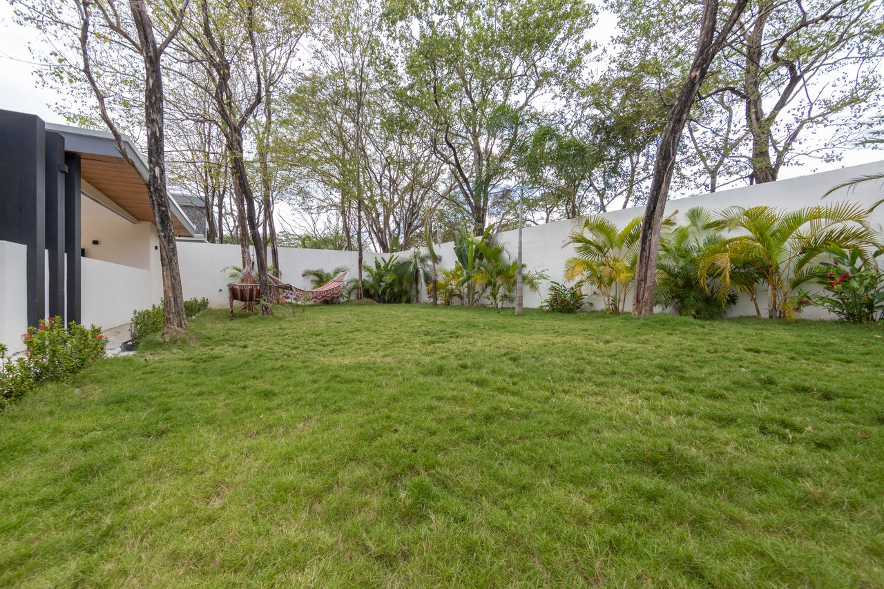 Casa Guacamaya Roja Lot B20 | Elegant 4-Bedroom Home with Pool & Outdoor Kitchen, Steps from Playa Grande Beach, Costa Rica