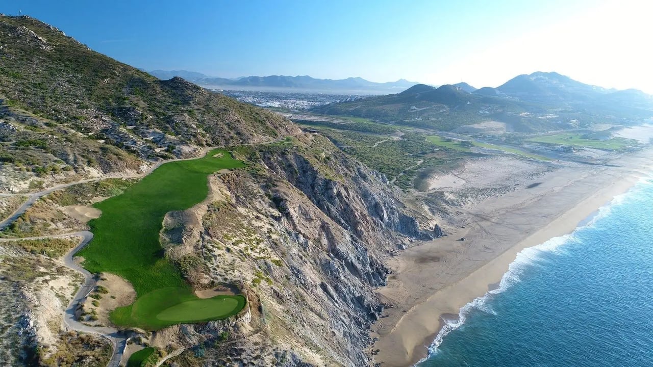 Chileno Bay fairway homes with open course views, outdoor living areas, and elegant resort-style design
